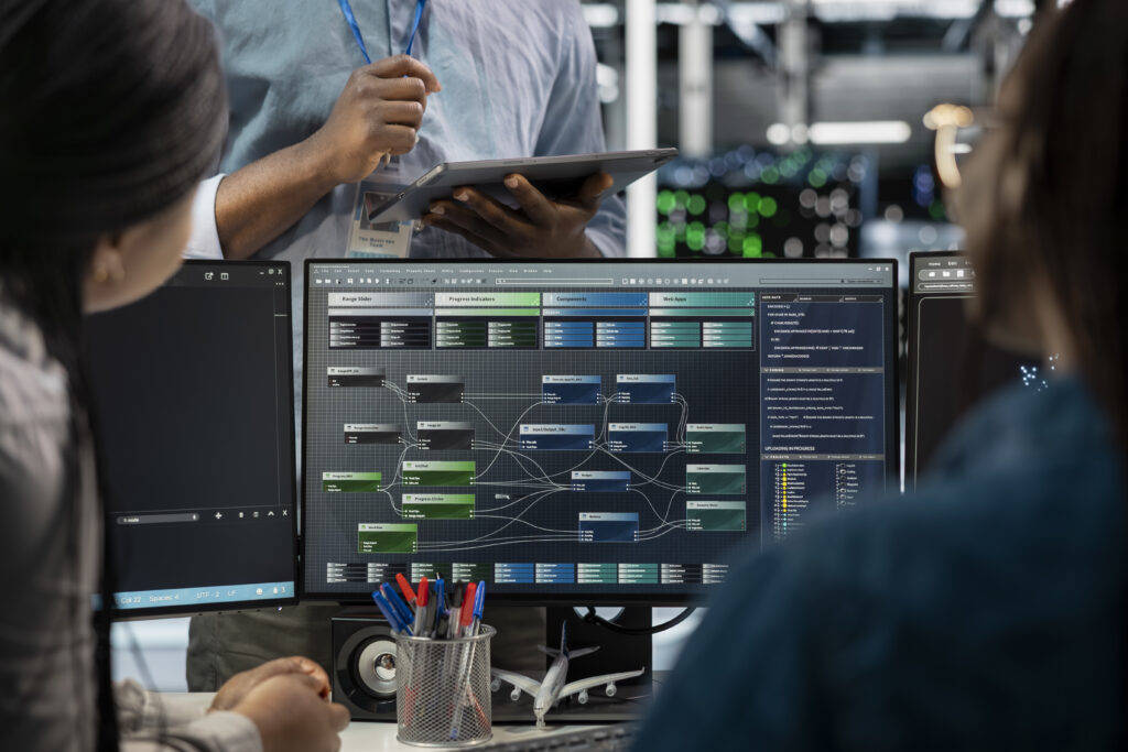 close up data center programmers using pc visualize ai neural networks